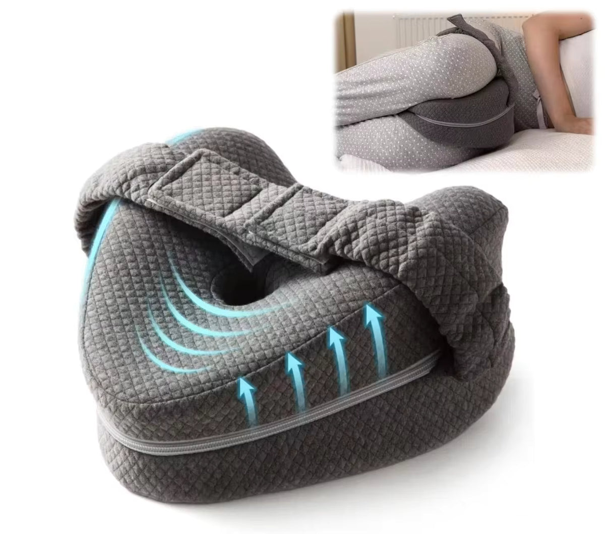 Gray contoured knee pillow with strap shown between a side sleeper's knees