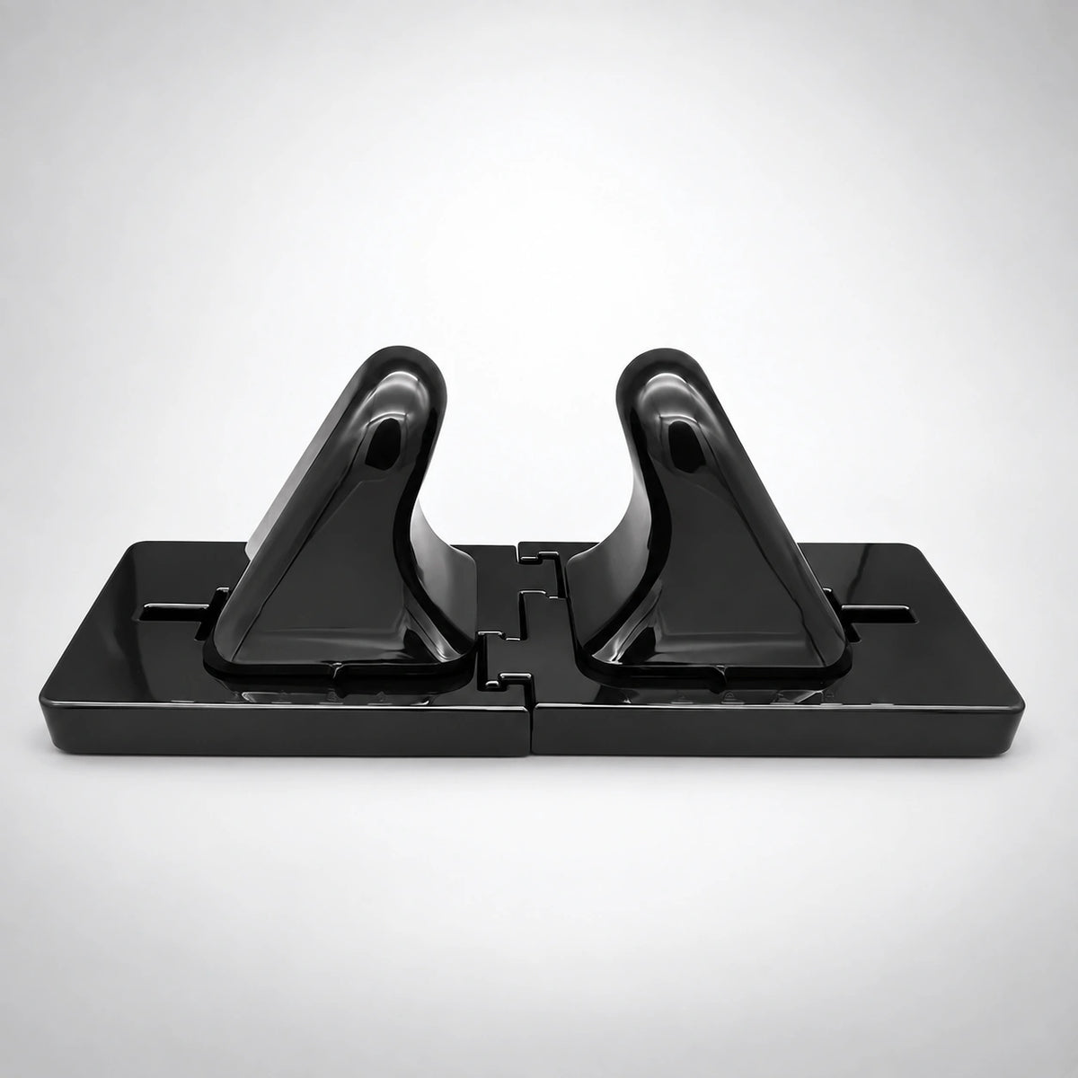 Black NASHIMPRO psoas muscle release tool with two curved heads on an adjustable base